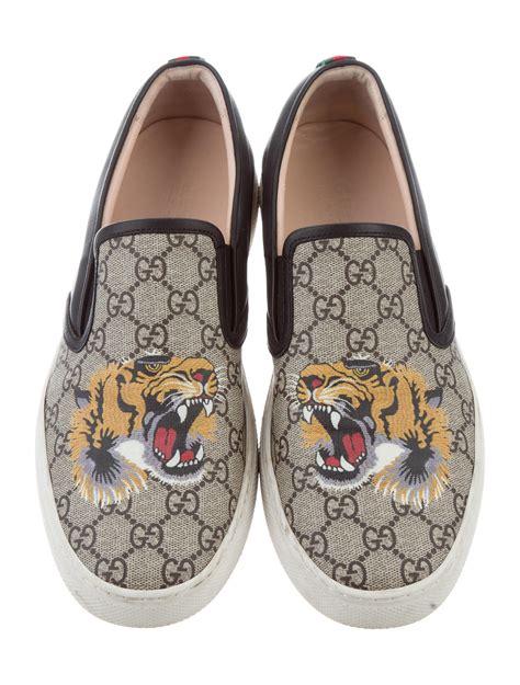 gucci tiger slip ons|Gucci denim slides.